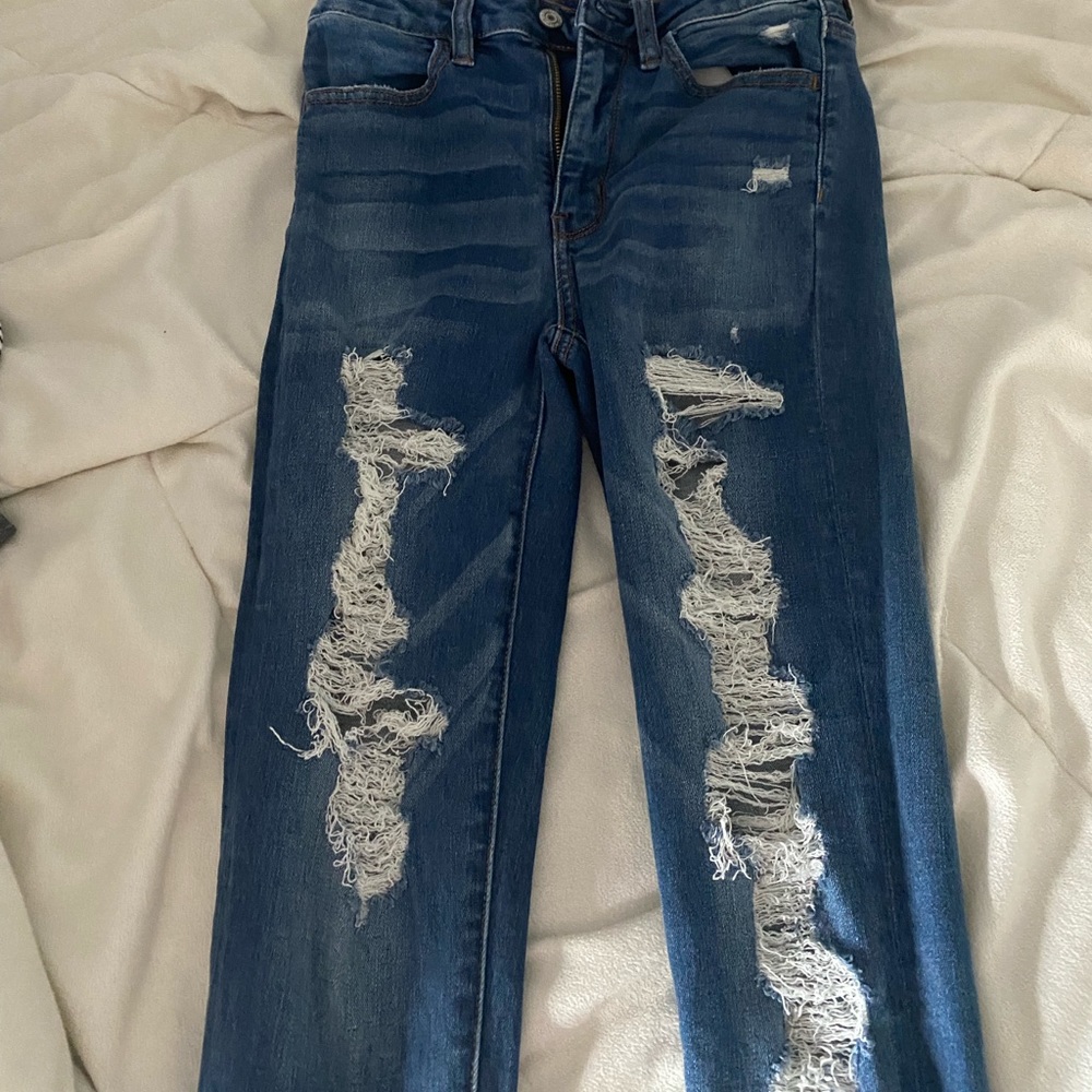 ripped jeans. never been worn